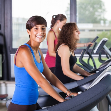 People Running on Treadmill in the Gymの写真素材