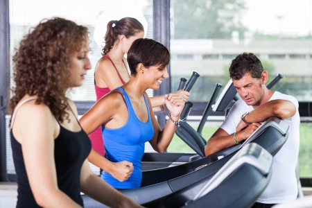 People Running on Treadmill in the Gymの写真素材