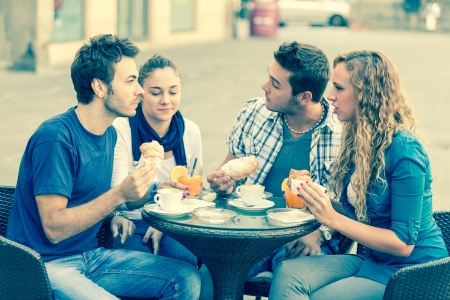 Group of Friends Having a Traditional Italian Breakfastの写真素材