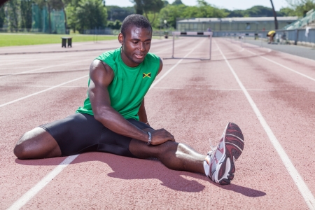 Track and Field Athlete Stretchingの写真素材