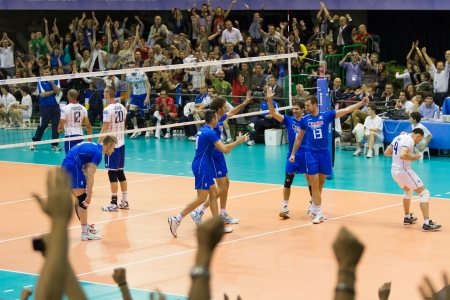 FLORENCE, ITALY - MAY 19: Italian team celebrating the victory of a World League match between Italy and France at Mandela Forum, Florence, Italy on May 19 2012のeditorial素材