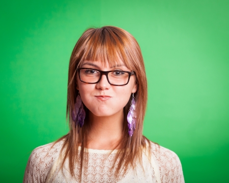 Beautiful Young Woman on Green Backgroundの写真素材