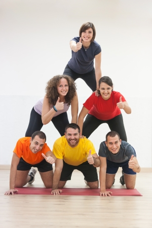 Human Pyramid and Thumbs Upの写真素材