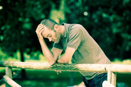 Pensive Adult Man at Parkの写真素材
