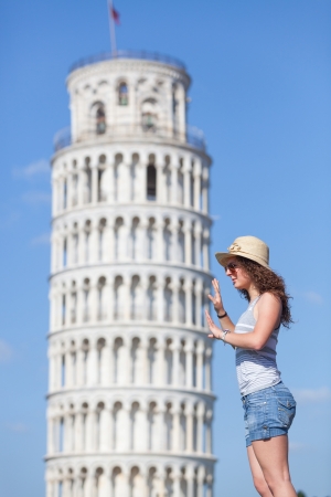 Young Girl with Leaning Tower of Pisaの写真素材