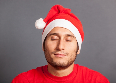Young Man with Santa Hatの写真素材