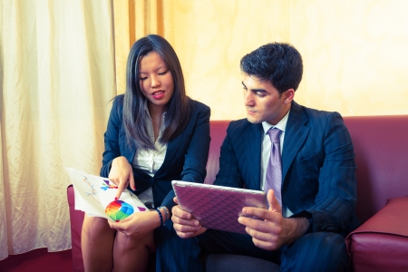 Young Business Couple on the Sofaの写真素材