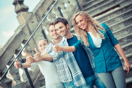 Group of Friends with Thumbs Upの写真素材