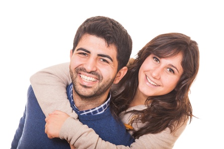 Young Man Giving a Piggyback to His Girlfriendの写真素材