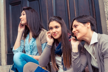 Group of Women Talking on Mobile Phoneの写真素材