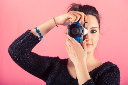Young Woman With Toy Cameraの写真素材