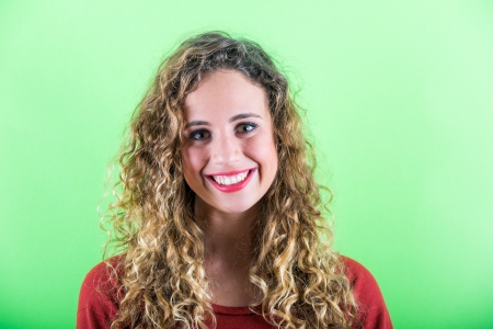 Beautiful Young Woman on Green Backgroundの写真素材