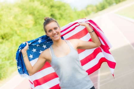 Beautiful Young Woman with USA Flagの写真素材