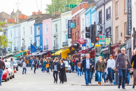 LONDON, UNITED KINGDOM - OCTOBER 27: People in Portobello Road, a famous market area in Notthing Hill district on October 27, 2013 in London, United Kingdom.のeditorial素材