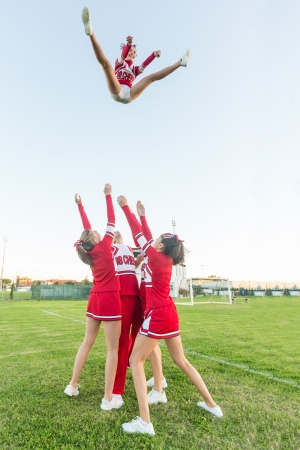 Group of Cheerleaders Performing Stuntsのeditorial素材