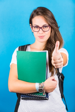 Female Student Portrait with Thumbs Upの写真素材