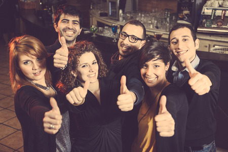 Happy Group of Friends in a Night Clubの写真素材