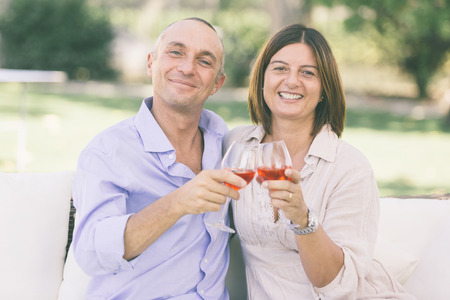 Mature Couple Having an Aperitif Outdoorの写真素材