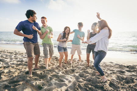 Multiracial Group of Friends Having a Party at Beachの写真素材
