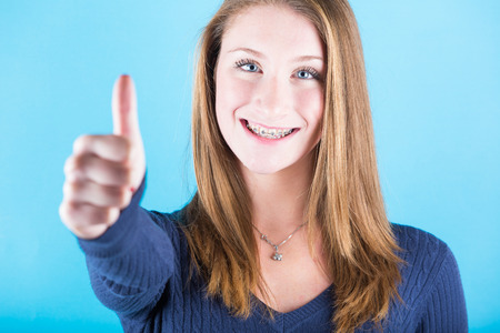 Young Girl with Thumbs Upの写真素材