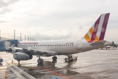 COLOGNE, GERMANY - MAY 12, 2014  Germanwings Airbus A319-300 at Cologne-Bonn Airport Terminal boarding passengers のeditorial素材