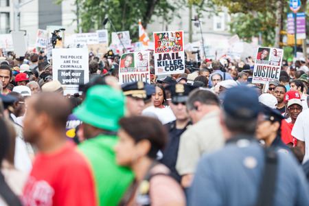 NEW YORK, USA - AUGUST 23, 2014: Thousands march in Staten Island to protest Eric Garnerâ€™s...