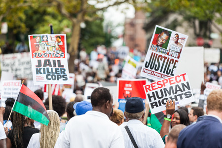 NEW YORK, USA - AUGUST 23, 2014: Thousands march in Staten Island to protest Eric Garnerâs death by NYPD cops.のeditorial素材