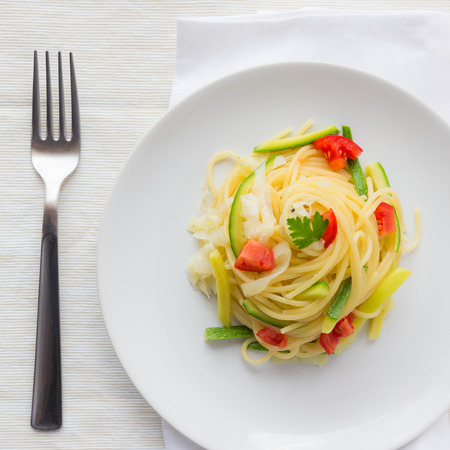 Spaghetti with Zucchini, Leeks and Fresh Tomatoの写真素材