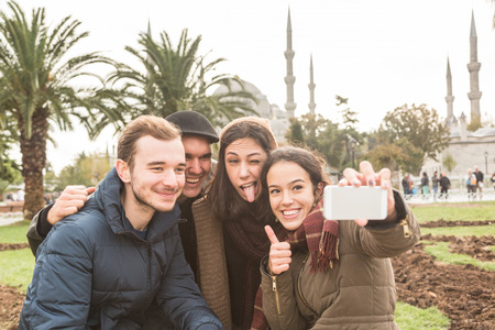 Group of Turkish Friends taking Selfie in Istanbulの写真素材