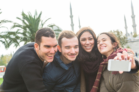 Group of Turkish Friends taking Selfie in Istanbulの写真素材