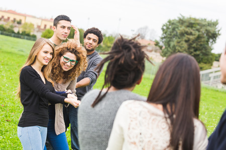 Multiracial People Playing Tug of Warの写真素材