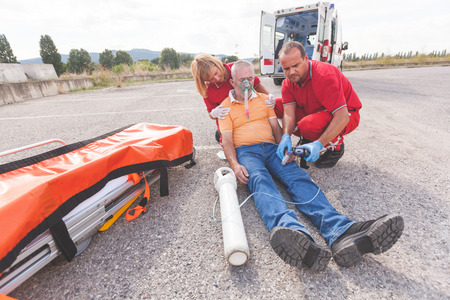 Rescue Team Providing First Aidの写真素材