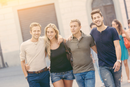 Group of Friends in Town Square, Friendship Themeの写真素材