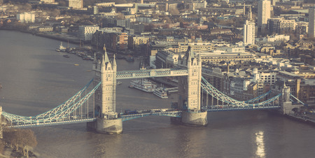 Tower Bridge over Thames river in London. Aerial view of the bridge from north-west in late afternoonの写真素材