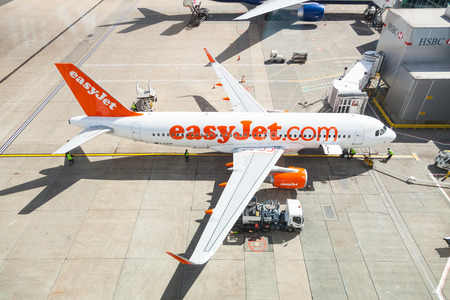 LONDON, UK - MAY 7, 2015: EasyJet airlines Airbus A320 at Gatwick LGW airport while refueling.のeditorial素材