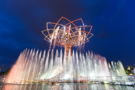 MILAN, ITALY - JUNE 01, 2015: The tree of life (Albero della vita in Italian) during night water-play show. The tree of life is the symbol of Expo 2015 area.のeditorial素材