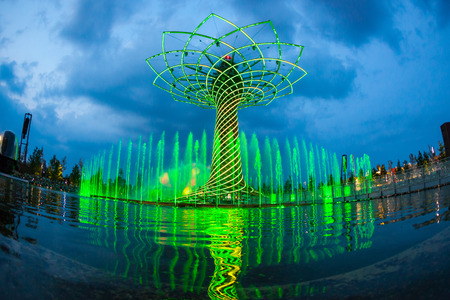 MILAN, ITALY - JUNE 01, 2015: The tree of life (Albero della vita in Italian) during night water-play show. The tree of life is the symbol of Expo 2015 area.のeditorial素材