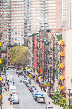 NEW YORK, USA - AUGUST 23, 2014: View of a street and buildings in China Town district. All signs and writings are written with chinese characters.のeditorial素材