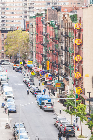 NEW YORK, USA - AUGUST 23, 2014: View of a street and buildings in China Town district. All signs and writings are written with chinese characters.のeditorial素材