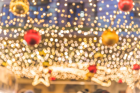 Blurred Christmas lights, festive background image at night. Background ready image, out of focus as shot, dreamy and fairy Christmasの写真素材