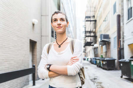 Confident young woman portrait in the city - Beautiful and successful woman wearing short hair and smart casual clothes - Lifestyle and travel in Chicagoの写真素材