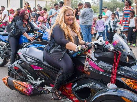 NEW ORLEANS, LA, USA - JANUARY 31, 2016: Women Motorcycle Riders in Mardi Gras Parade on St. Charles Avenue in New Orleansのeditorial素材