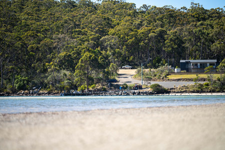 A view of the beach on a sunny day in Tasmania, Australiaの写真素材