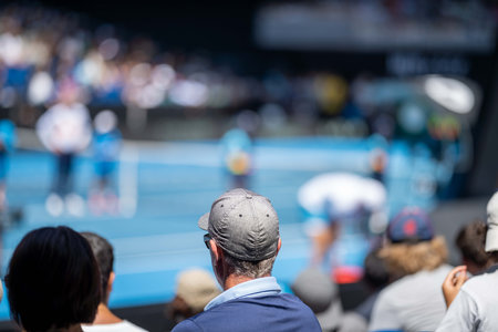 female Professional athlete Tennis player playing on a court in a tennis tournament in summer