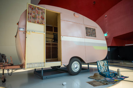 vintage silver car and caravan in a showの写真素材