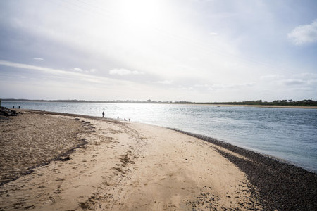 walking on an australian beach at low tide