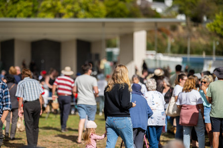 Weekend country market in a park in Australia. Familyâ€™s and people at a Farmers market...