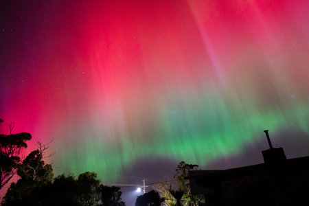 Aurora borealis in the night sky, northern lights.の写真素材