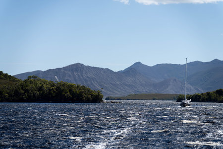 sailing on a yacht in the australian in the remote forest wilderness in spring in australia and new zealandの写真素材