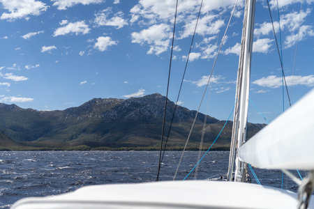 sailing on a yacht in the australian in the remote forest wilderness in spring in australia and new zealandの写真素材